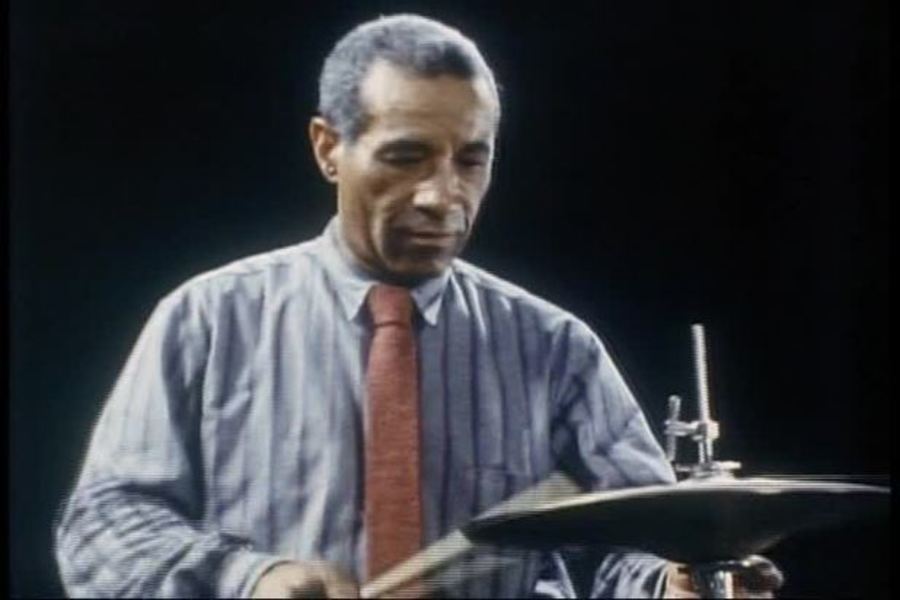 Cover image for Sit Down and Listen: The Story of Max Roach